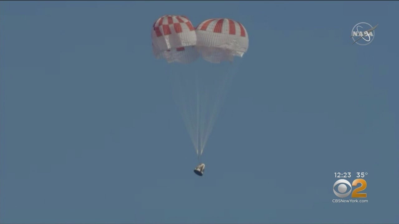 SpaceX Capsule Splashes Down