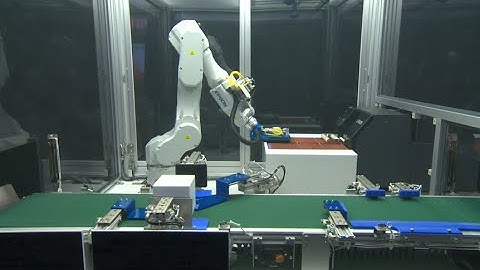 6-axis Epson Robot C4 Label sticker placement by robot iREX2019