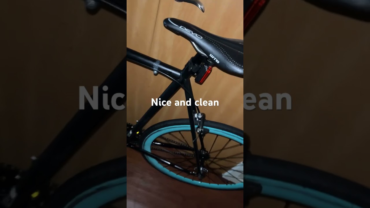 Bald black guy on a bike!