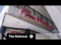 More Tim Hortons cut employee benefits over minimum wage increase