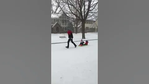 Sledding down the street