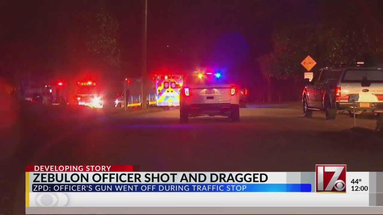 Zebulon officer shot after his firearm goes off while being dragged by