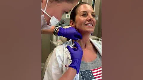 Dr. Alexis Russo giving Dr. Aimee Russo Cosmetic I...