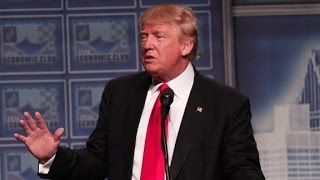 More national security experts warn against Trump