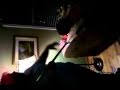 Liz prying garett out of a chair with hockey stick Liz prying garett out of a chair with hockey stick
