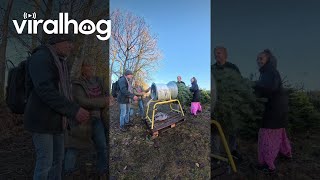 Jumping Through a Christmas Tree Netting Machine || ViralHog