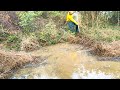 Removing Trash And Debris Flow Clogged Way Drain Water To Farm Near Speed Way