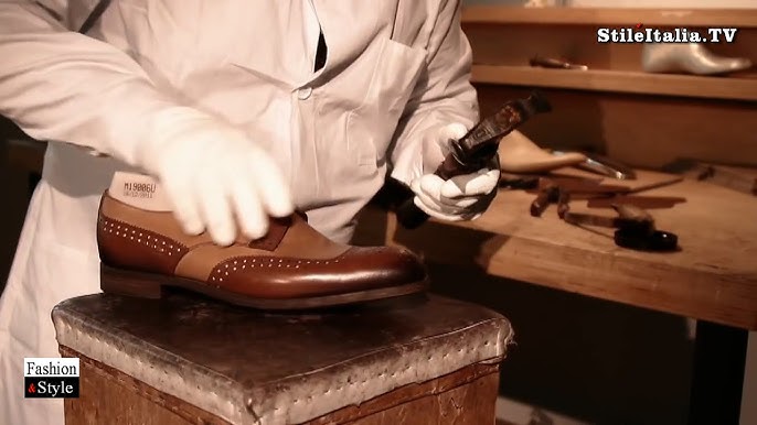 A footwear technician of the Atelier Manufacture de souliers Louis Vuitton  in Fiesso d Artico
