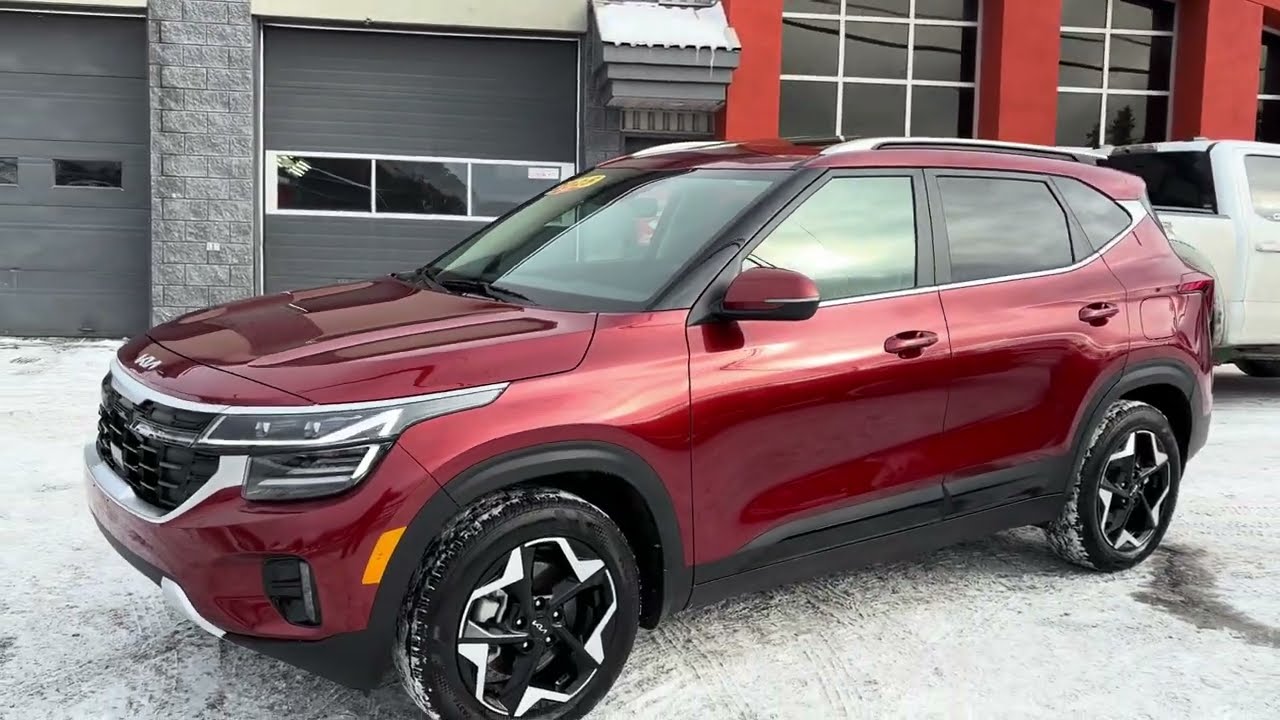 2025 kia seltos ex premium, orange lunaire avec seulement 8809km mention reconstruit stock 55749