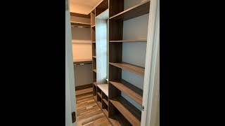 woodgrain custom designed closet.