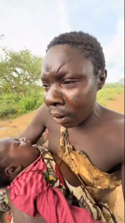 Hadzabe Tribe bushmen❤️ Chabba is on Father duty today as he sings and cares for his son while wife