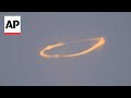 Mount etna blows spectacular smoke rings into the sky