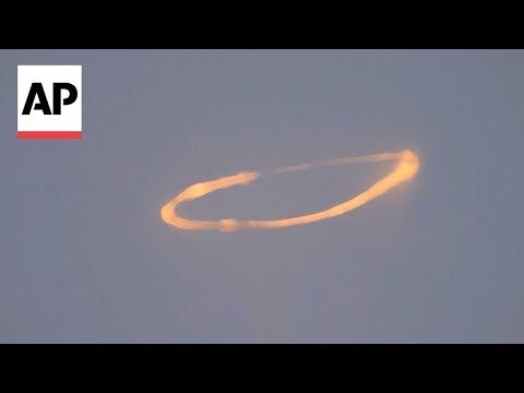 Mount Etna blows spectacular smoke rings into the sky