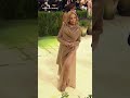 Singer Doja Cat walks the stairs at the 2026 Met Gala | NBC New York