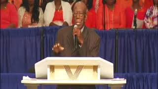 Bishop J. J. Johnson honors Mother Willie Mae Rivers