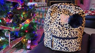 What's In My Mini Backpack 🐆🎄 with @momambition