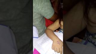 Margaux learning tp read a simple sentence