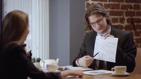 Man Explains Graph Stock Video