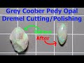 Dremel cuttingpolishing a green grey base coober pedy opal