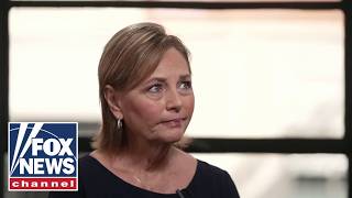 Darline Graham explains her how she differs from brother Lindsey
