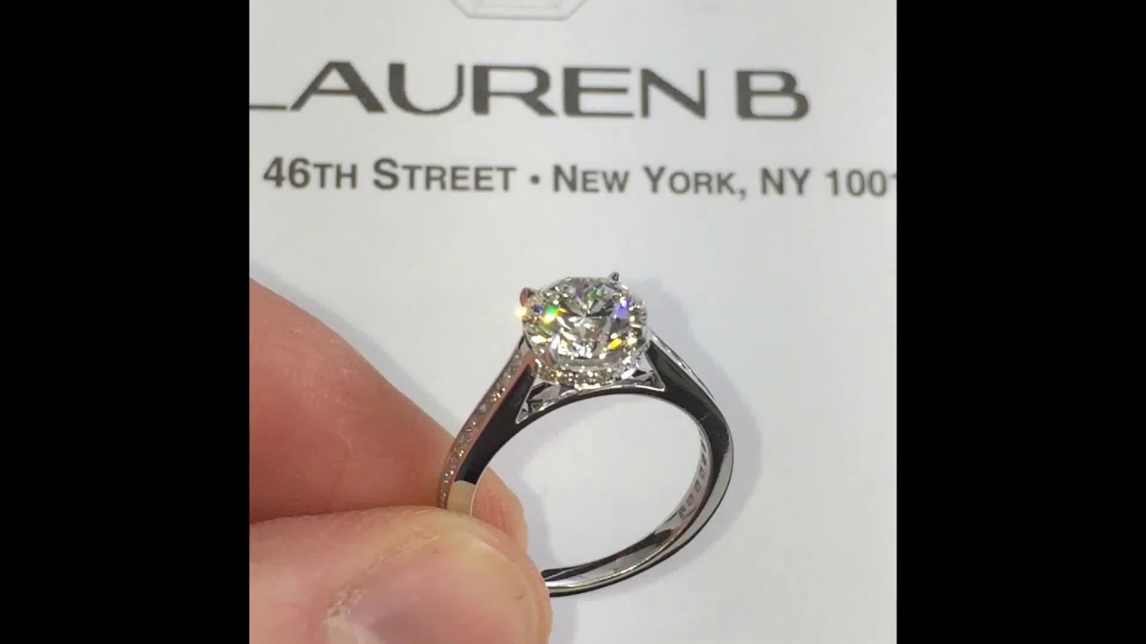 Round Diamond Channel Set Cathedral Band Engagement Ring