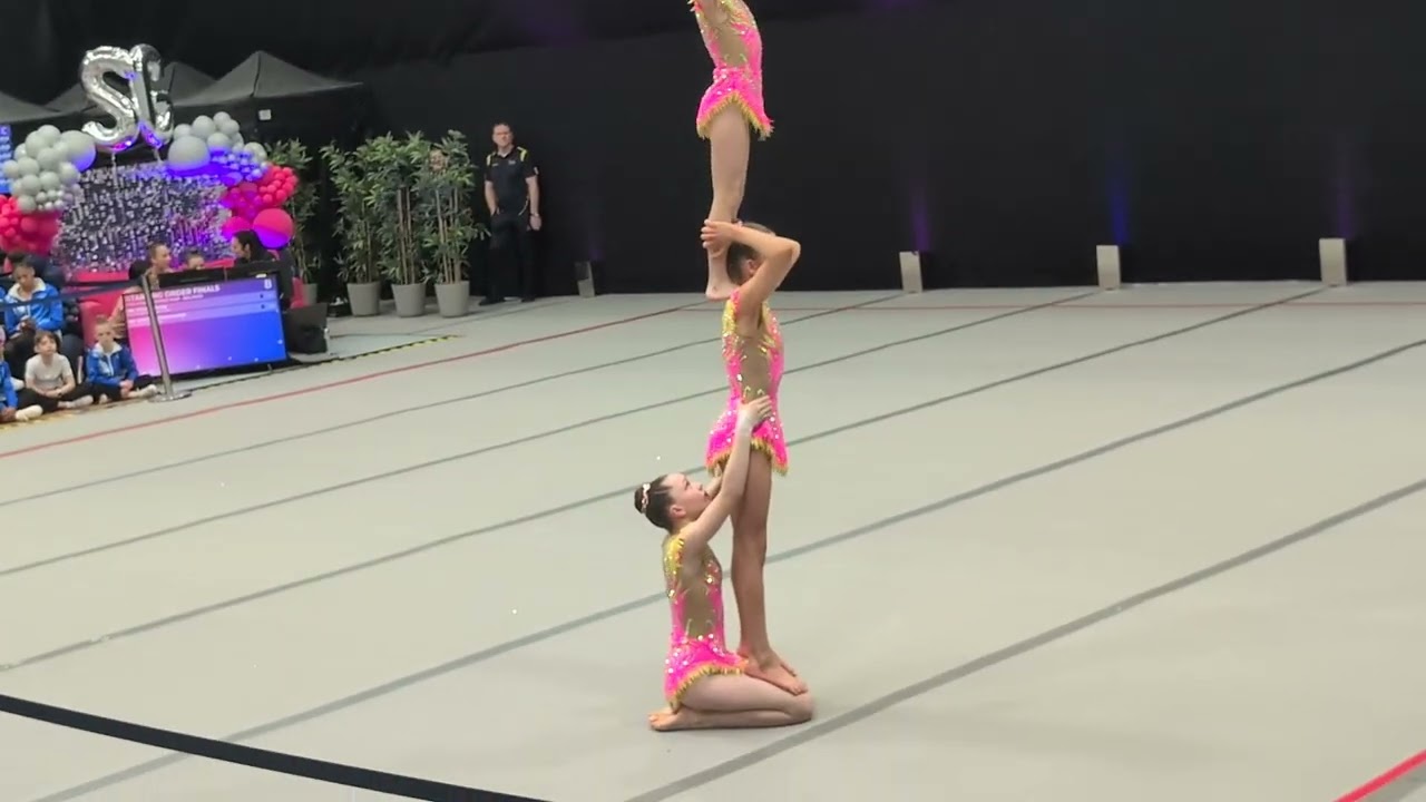 Emma, Eva and Zlata (Hope Acro). Grade 4 WG @ Spelthorne Acro Cup 2025. 25.200 - 15th/36