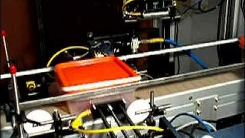 Label Printer Applicator on 3 Sides of a Container