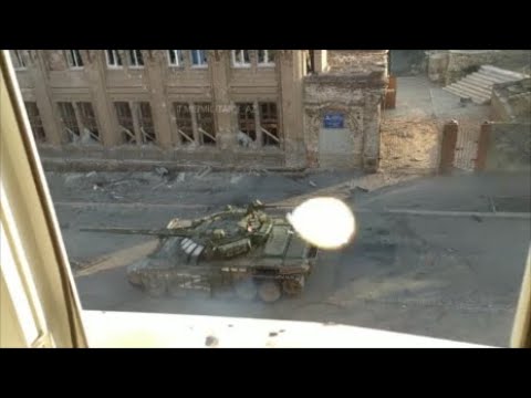 Russian T-72 tank hit by RPG-7 round on the streets of Mariupol
