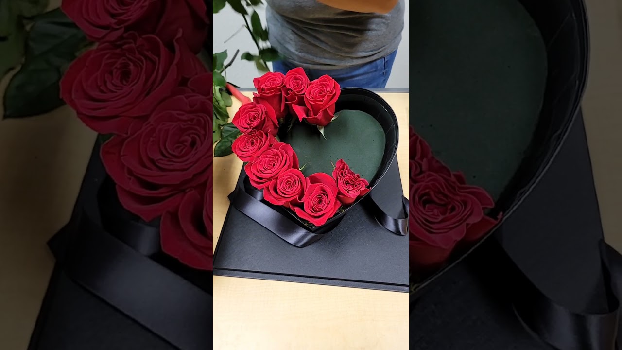 An Acrylic Pink Heart Box Flower Arrangement