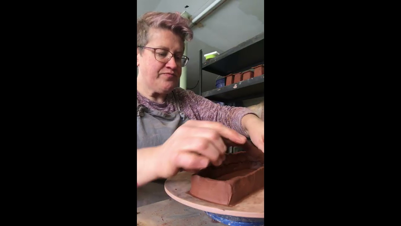 Attaching the top of the box.