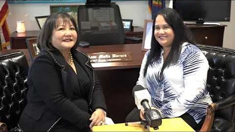 Liz Duenas talks property regulations with Speaker...