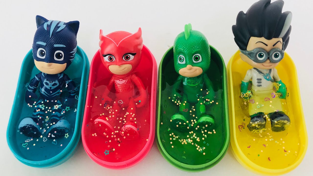 Pj Masks toys and toy bathtubs and finger paints and colorful water