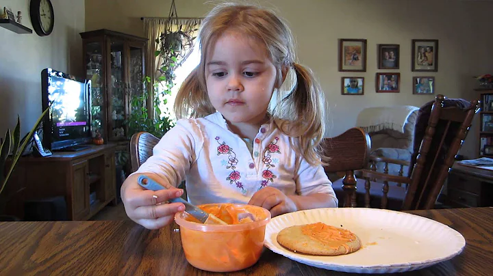 Hannah decorating Halloween cookies