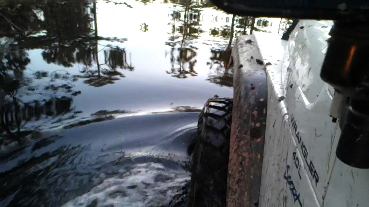 Tj wrangler on 37s and 4.88 gears easin In a hole.