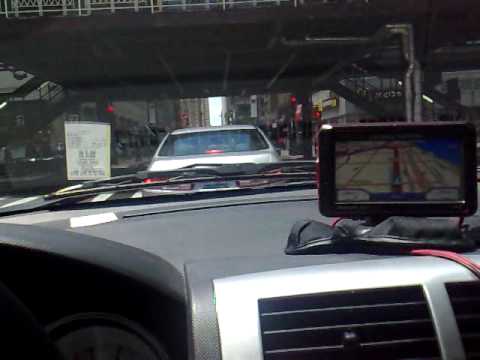 Luke drives in parking garage into Chicago