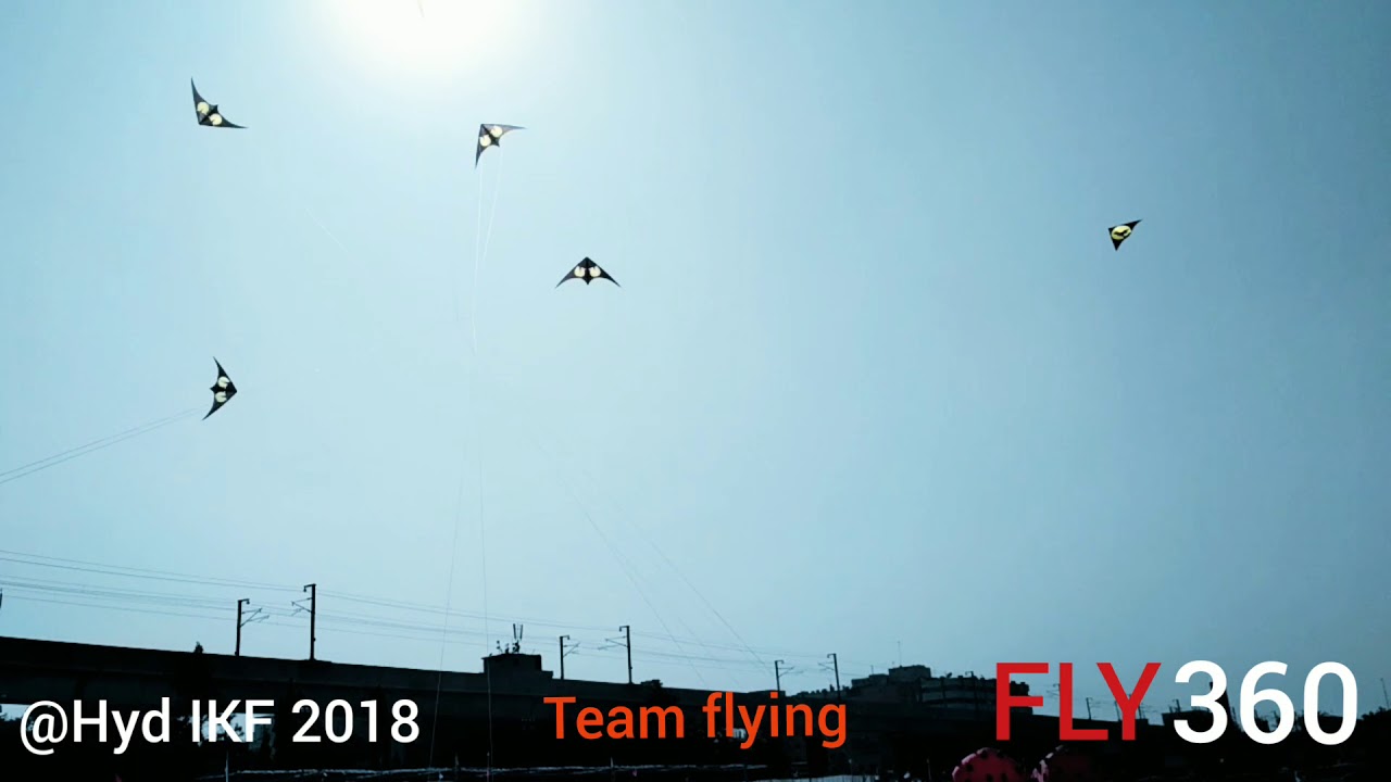 Dual line stunt kite team flying