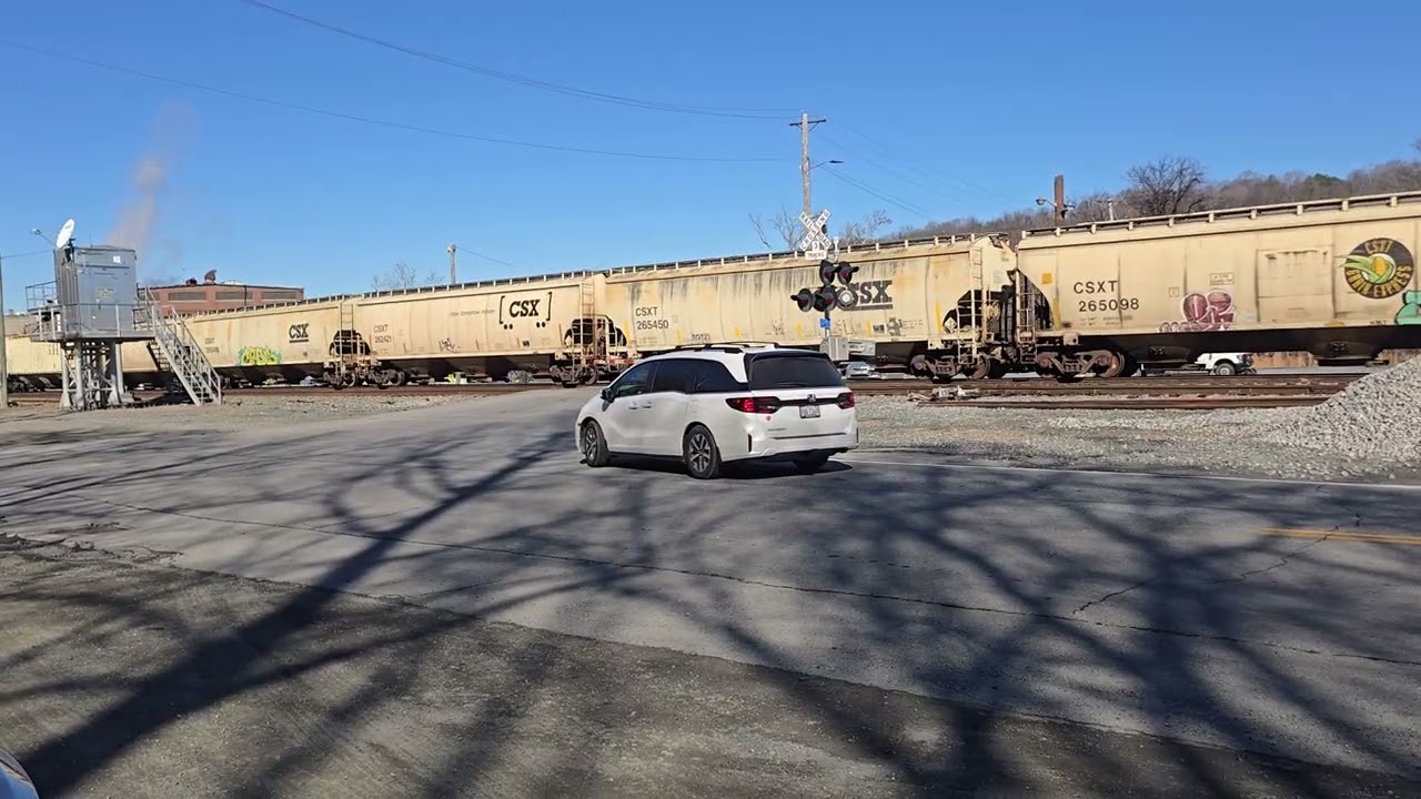 CSXT# 3012 ES44AH YN3B leads Grain Train through the James River Sub