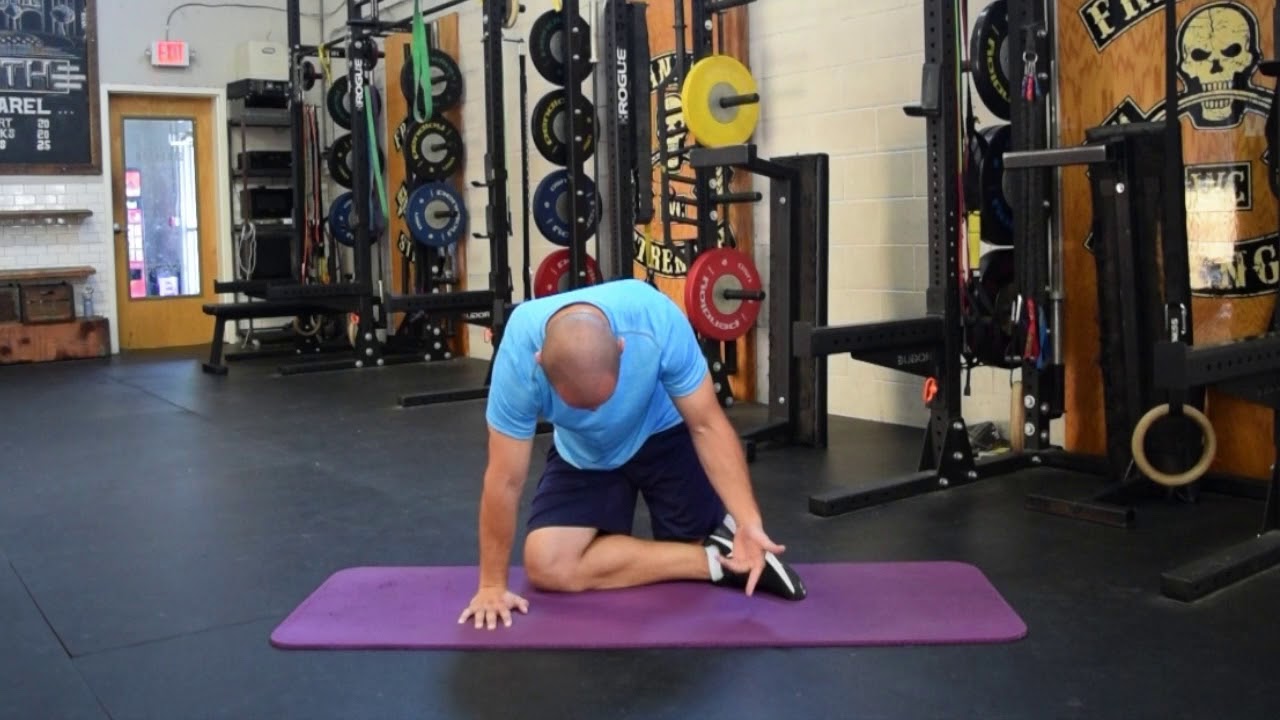 quadratus-femoris-stretch-standing-pigeon