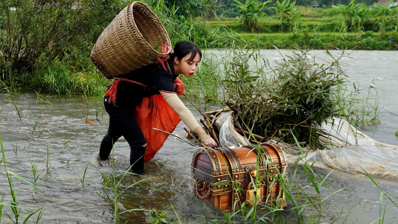 Poor girl searches for treasure and many valuable objects after historic flash flood