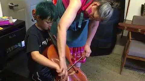 Jennifer Becker Helping a new student with his fir...