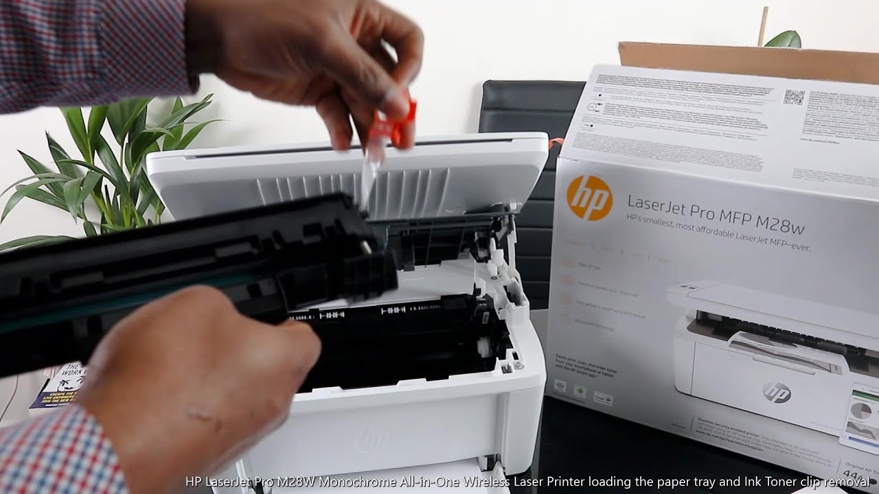 HP LaserJet Pro M28W All in One Wireless Printer loading the paper tray and  Ink Tone clip removal 