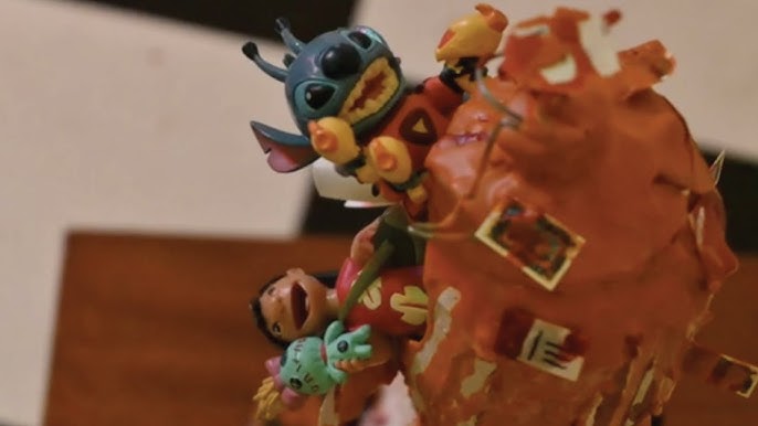 Stitch and Jumba Play Hot Potato With a Nearly-Exploded Gun 