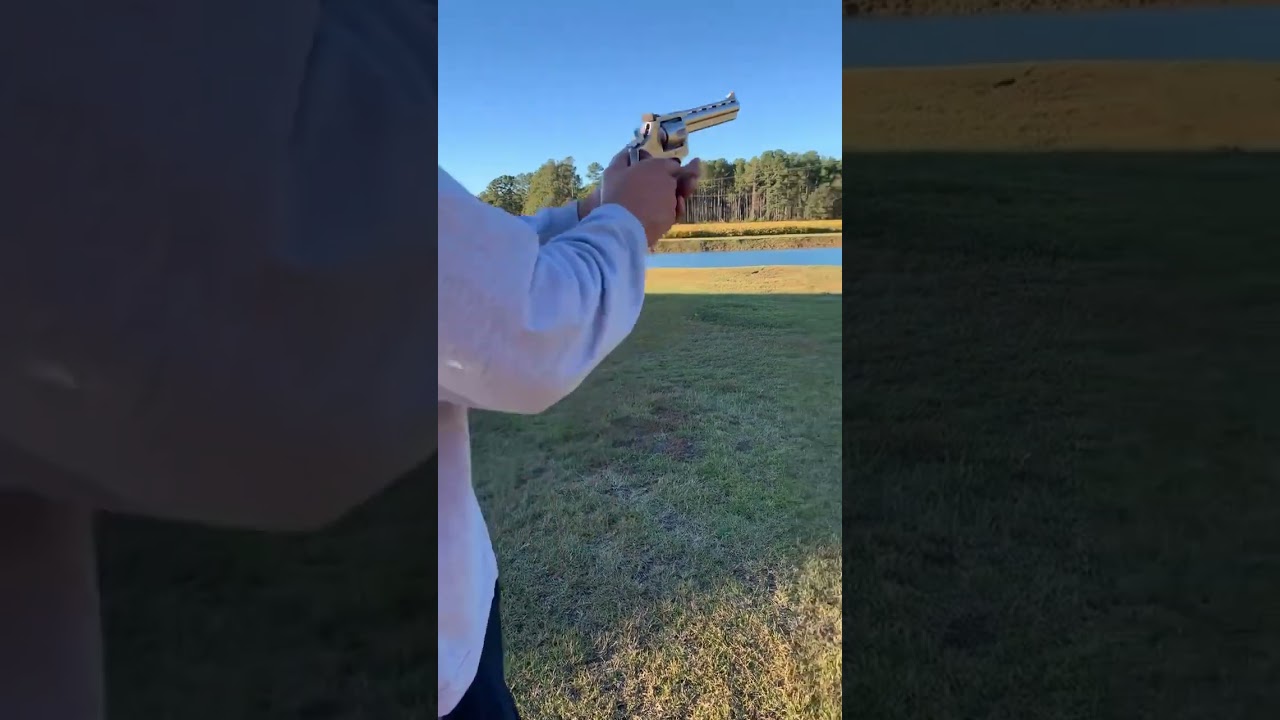 Shooting a Taurus 357 magnum at some steel.