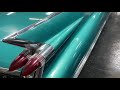 Restoring the paint on a 1959 Cadillac Coupe Deville.