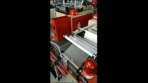 Full automatic rolling garbage bag making machine