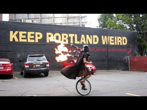Thumbnail for the embedded element "Unicycling Darth Vader upgrades to Flaming Bagpipes - Keep Portland Weird - The Unipiper *Official*"