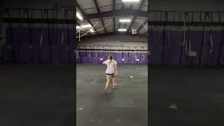 13 year old girl with high toss volleyball jump serve