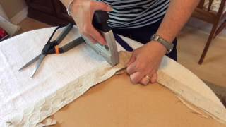 This Real Life DIY episode shows how to staple the corners when recovering chair cushions. It can be done quickly and easily (