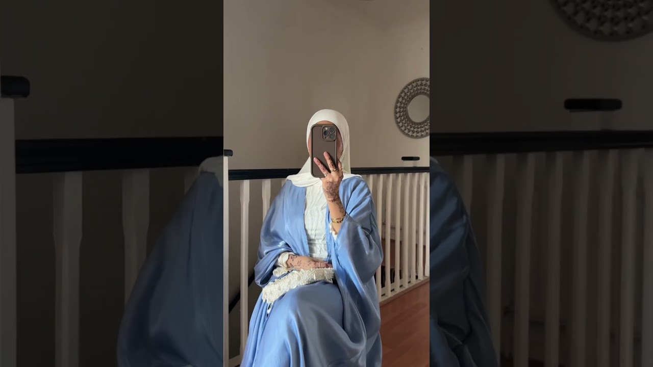 Stylish Modest Fashion Look: Hijab, Blue Abaya, and Henna