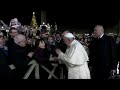 Pope sorry for slapping hand of woman who grabbed him